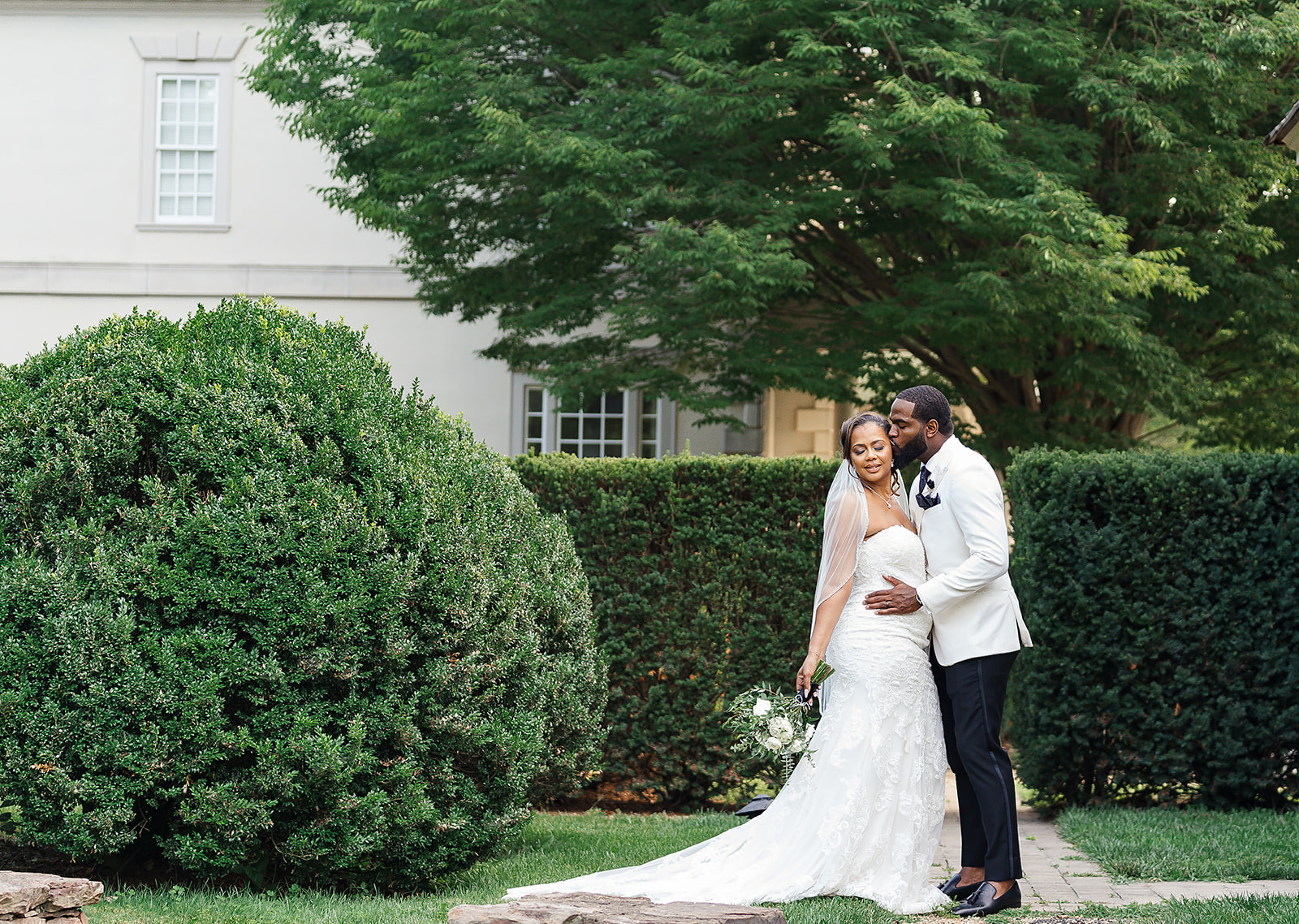 Couple portrait in estate garden