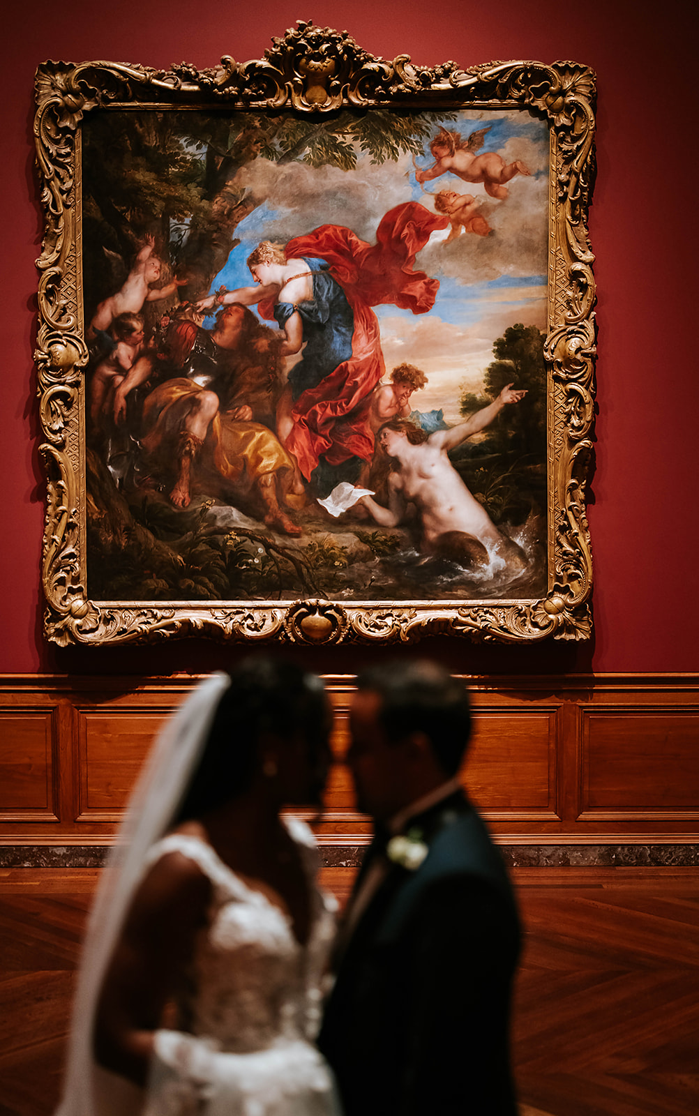 Couple silhouette kiss in art museum with renaissance painting