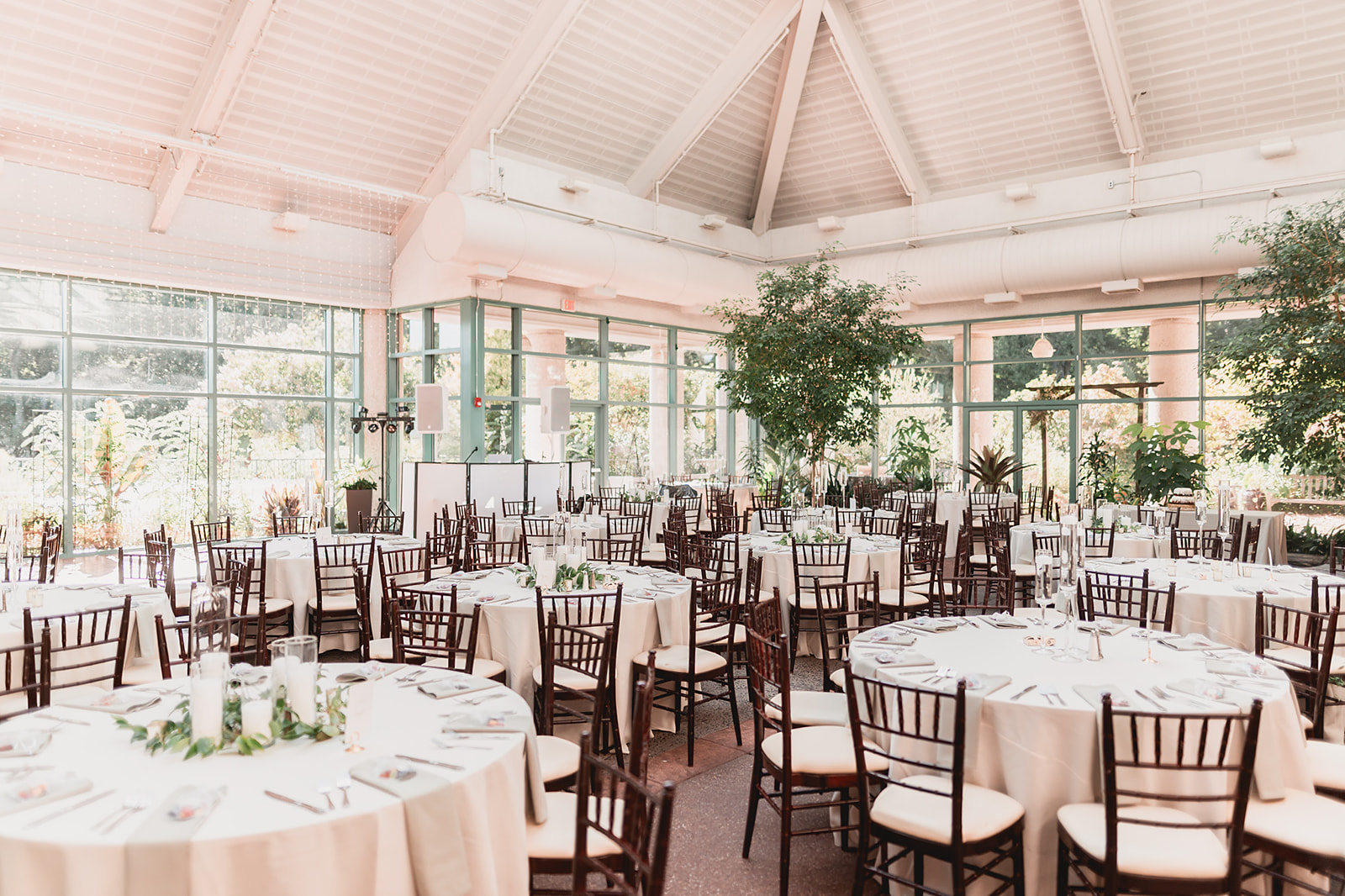 Garden conservatory reception with mahogany chiavari chairs