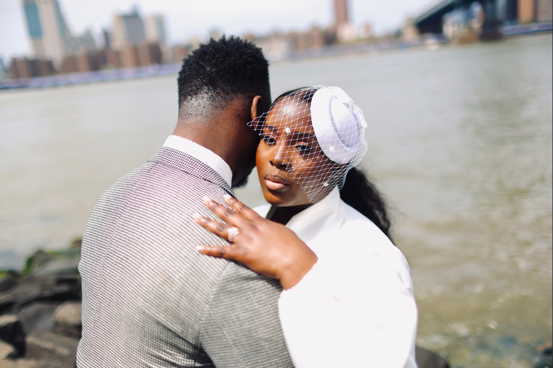 Couple at Brooklyn waterfront with birdcage veil