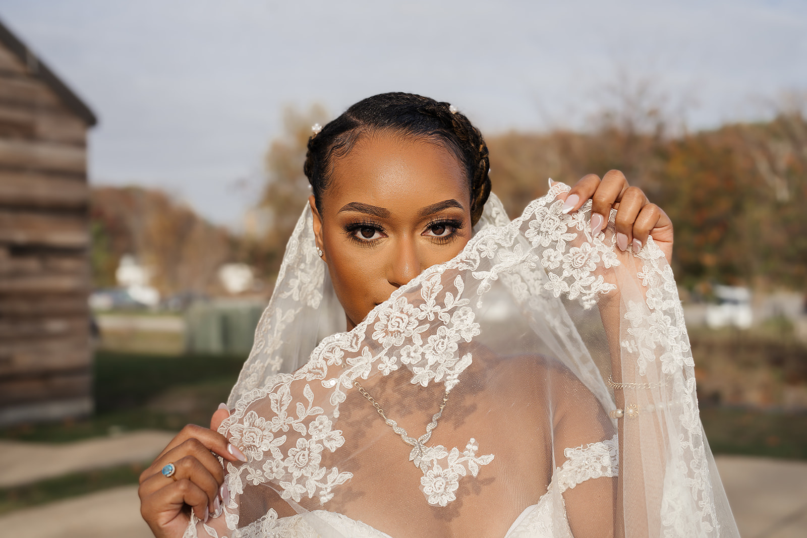 Bride lace veil closeup eyes autumn outdoor portrait