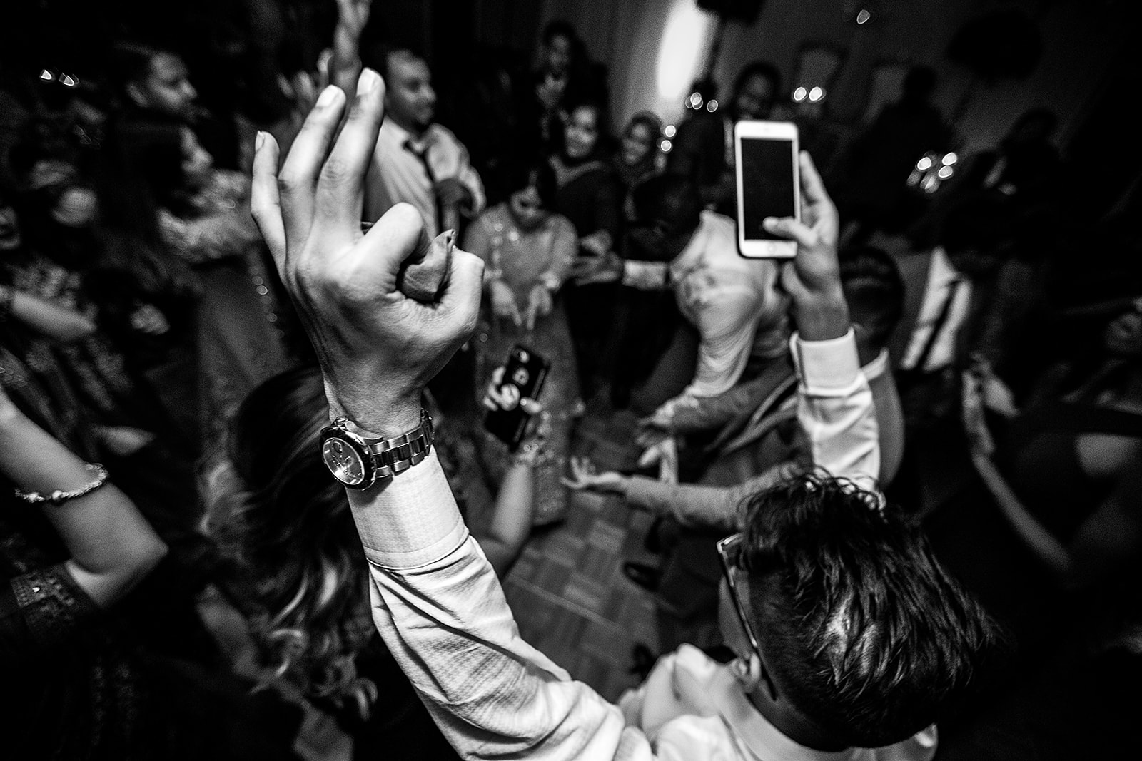 Reception dance floor candid in black and white