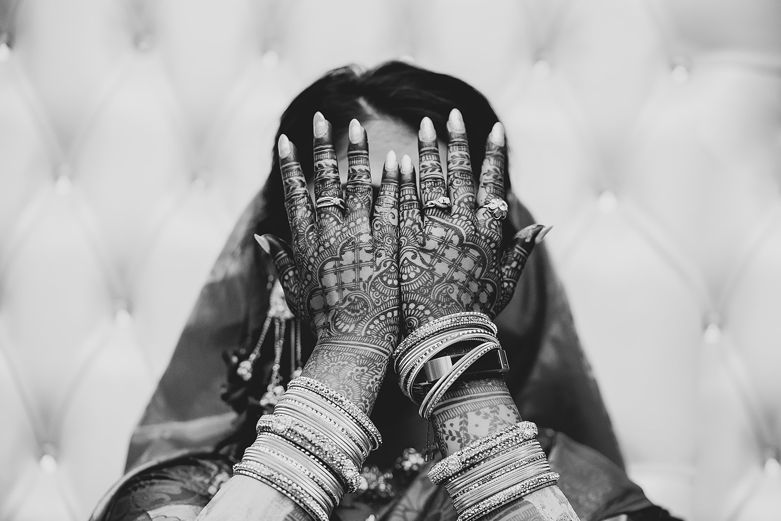 South Asian bride mehndi henna hands black and white closeup