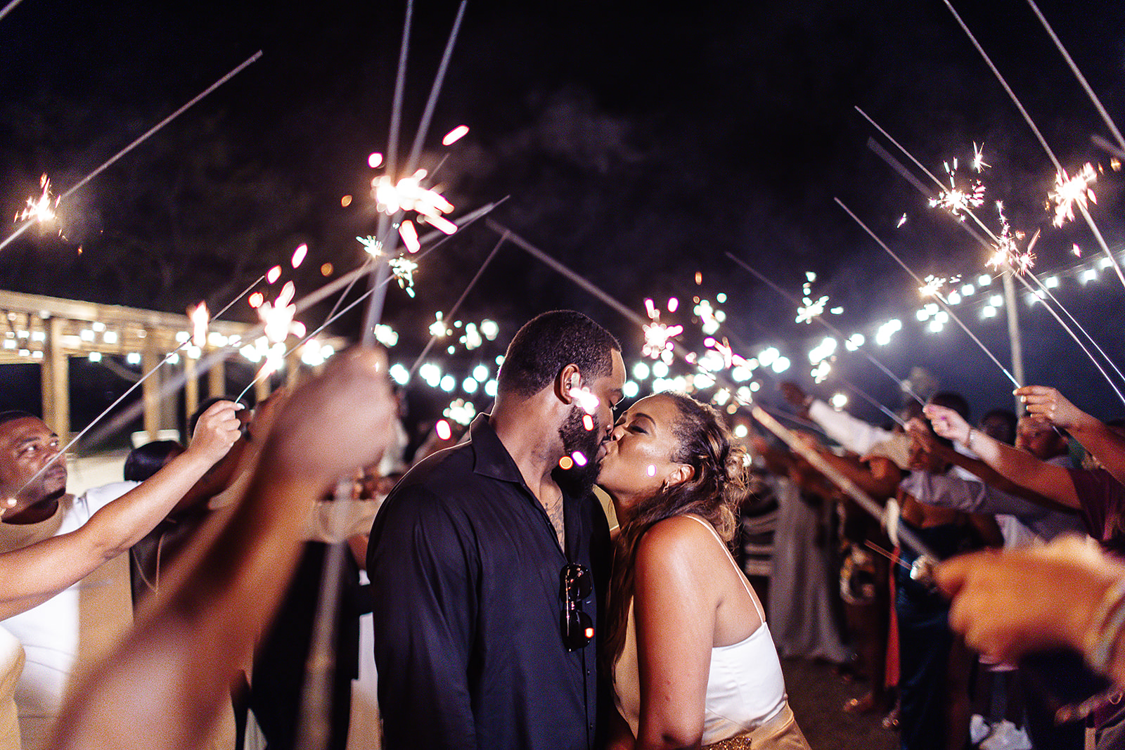 Sparkler send-off outdoor kiss